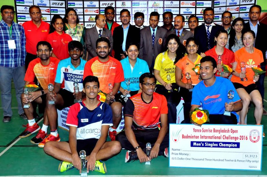 The winners of the Yonex-Sunrise Bangladesh Open Badminton International Challenge with the guests and officials of Bangladesh Badminton Federation pose for photograph at the Shaheed Tajuddin Ahmed Indoor Stadium on Saturday.