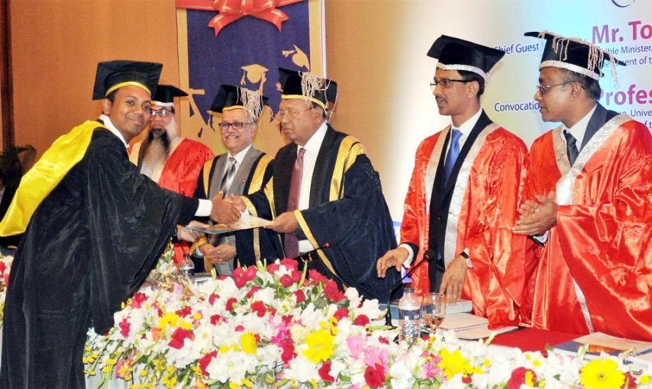 Commerce Minister Tofail Ahmed, MP distributes certificates among the recipients at the ICMAB Convocation-2016 held at Pan Pacific Sonargaon Hotel in the capital recently.