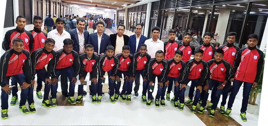 The Bangladesh Under-14 football team pose for photo after reached Malaysia on Sunday.