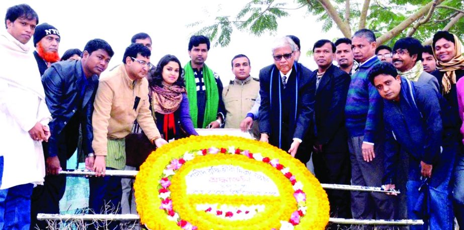 RANGPUR: Prof Dr AKM Nurun Nabi, VC, Begum Rokeya University placing wreaths at Domdoma Mass Graveyard in observance of the Martyred Intellictuals Day yesterday.