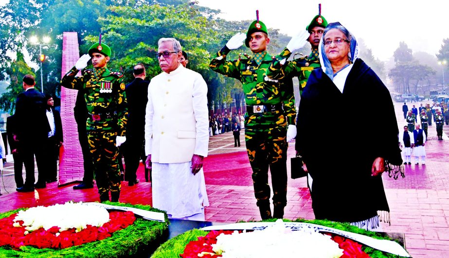 President Abdul Hamid and Prime Minister Sheikh Hasina stood in solemn silence for some time as mark of respect after placing wreath at Martyred Intellectuals Memorial in Mirpur on Wednesday.