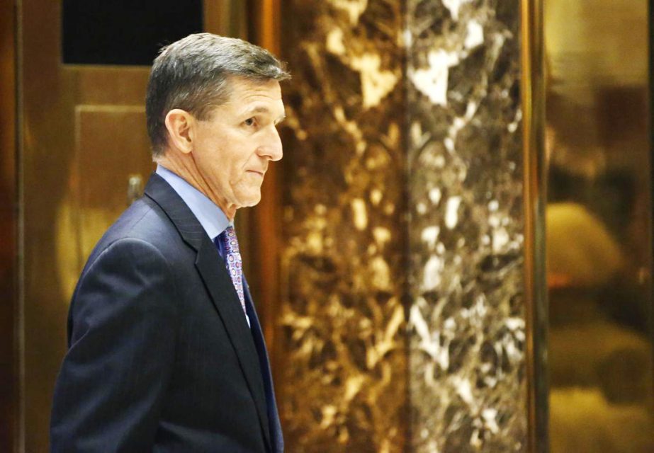 Michael T. Flynn, President-elect Donald Trump's choice for National Security Advisor, waits for an elevator at Trump Tower on Monday in New York.