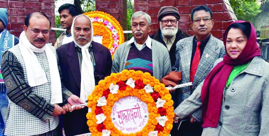 RANGPUR: Leaders of different social and cultural organisations placing wreaths at the Central Shaheed Minar paying tributes to Martyred Intellectuals in observance of the Martyred Intellectuals, Day on Wednesday.