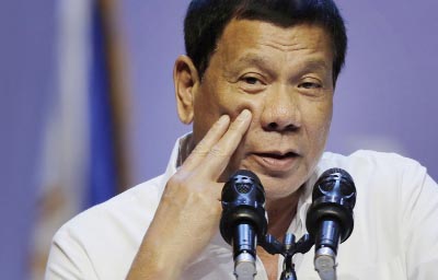 Philippine President Rodrigo Duterte speaks to the Filipino community in Singapore on Friday.