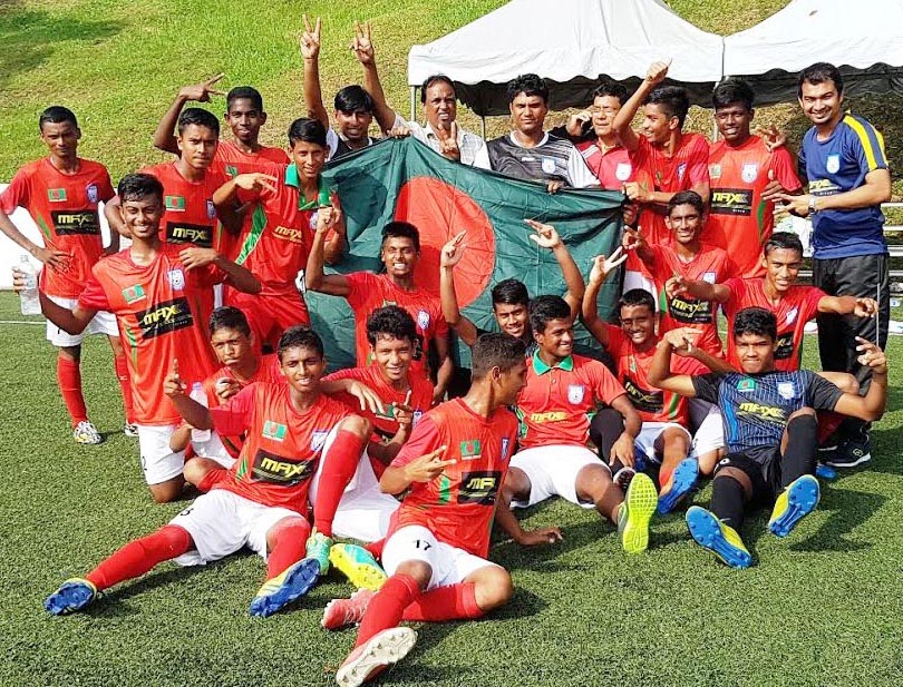 Players of Bangladesh Under-14 Football team celebrate after beating Shonam Ballmare of Japan at MSN-Field D, Bukit Jalil, Malaysia on Sunday.