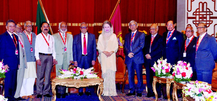 BNP's delegation led by its Chairperson Begum Khaleda Zia poses for photo session with President Abdul Hamid after talks on Election Commission reconstitution at Bangabhaban on Sunday.