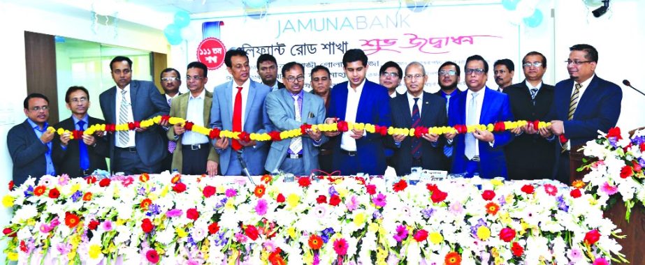 Gazi Golam Murtoza, Chairman, Jamuna Bank Limited inaugurates its 111th branch at Elephant Road in the city on Monday. Nur Mohammed, Chairman, Jamuna Bank Foundation, Shafiqul Alam, Managing Director and Narayan Chandra Shaha, Independent Director of the