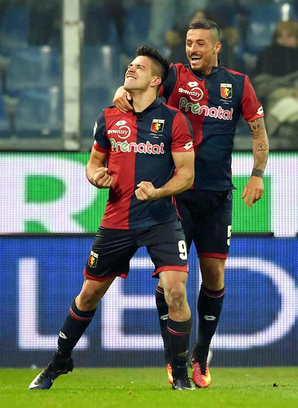 Genoa's Giovanni Pablo Simeone (left) celebrates with teammate Armando Izzo after scoring during a Serie A soccer match between Genoa and Palermo at the Luigi Ferraris Stadium in Genoa, Italy on Sunday.