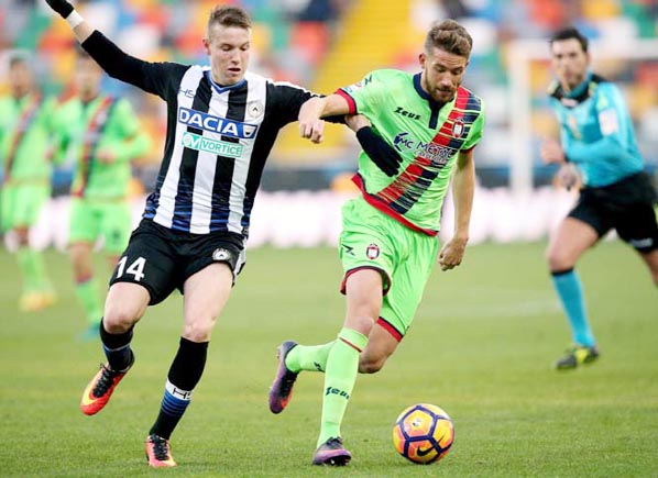 Udinese's Jakub Jankto (left) and Crotone's Marcus Christer Rohden compete for the ball during the Serie A soccer match between Udinese and Crotone at Udine's Friuli Stadium, Italy on Sunday.