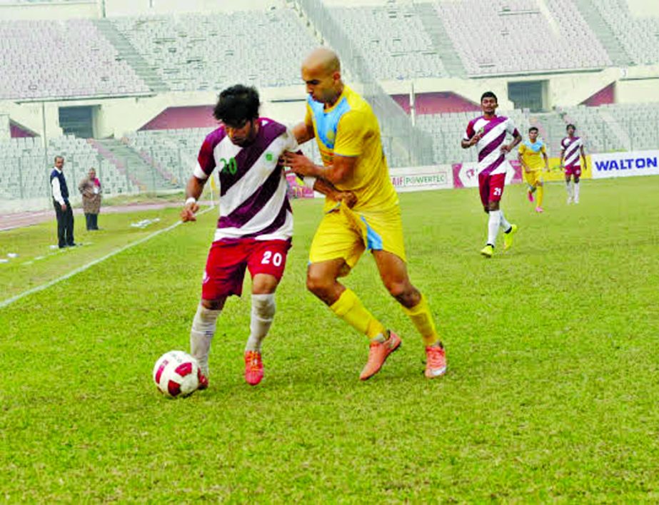 An action from the match of the JB Bangladesh Premier League Football between Chittagong Abahani Limited and Team BJMC at the Bangabandhu National Stadium on Monday.