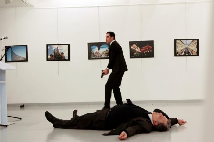 Russian Ambassador to Turkey Andrei Karlov lies on the ground after he was shot by Mevlut Mert Altintas at an art gallery in Ankara, Turkey. Hasim KilicHurriyet via REUTERS