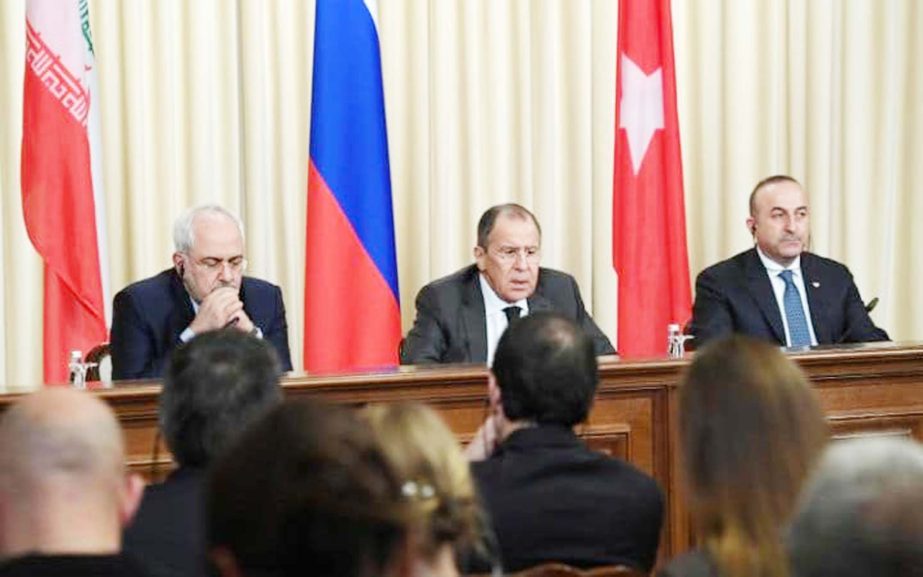 Sergei Lavrov, the Russian foreign minister (centre), hosted his Iranian and Turkish counterparts at an unprecedented summit in Moscow.