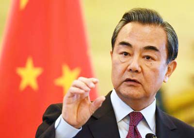 Chinese Foreign Minister Wang Yi speaks during a joint press conference with Iranian Foreign Minister Mohammad Javad Zarif in Beijing, China.