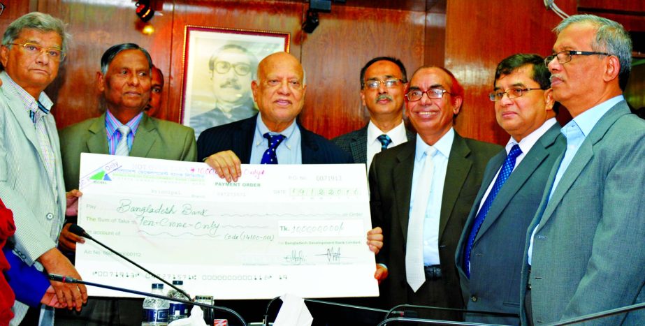 Md Yeasin Ali, Chairman, Board of Directors Bangladesh Development Bank Ltd handed over a cheque of Tk1million to the Finance Minister Abul Maal Abdul Muhith MP, as cash dividend of the bank to the government for the year 2015. MA Mannan MP, State Ministe