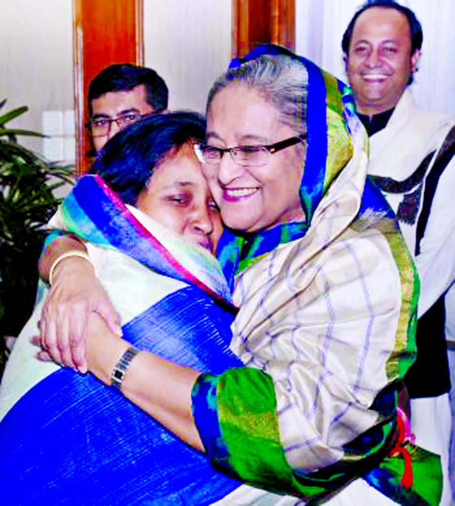 The affectionate Prime Minister Sheikh Hasina hugging the newly elected NCC Mayor Selina Hayat Ivy when she went to Gonobhaban on Friday evening after clinching landslide victory on Thursday's election.