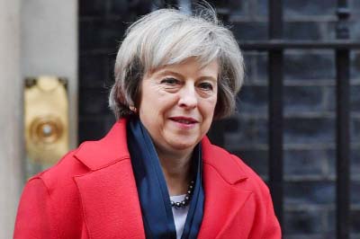 British Prime Minister Theresa May said Britain needed to unite and seize the opportunity to forge a new role in the world as it leaves the European Union.