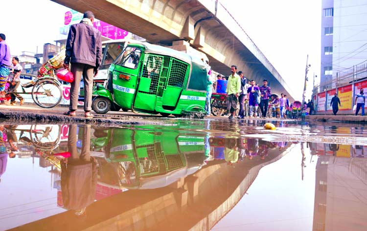 Pedestrians and passengers also facing untold sufferings due to water stagnant for the absence of proper drainage system. The snap was taken from in front of Jatrabai thana in the city on Sunday.