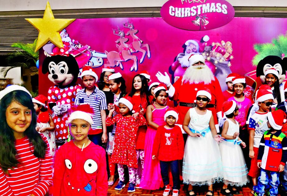 As the Christmas, the biggest religious festival of the Christian community, being celebrated in Bangladesh as elsewhere in the world on Sunday, the kids are seen enchanted when Santa Claus makes his appearance before them at Pan Pacific Sonargaon Hotel