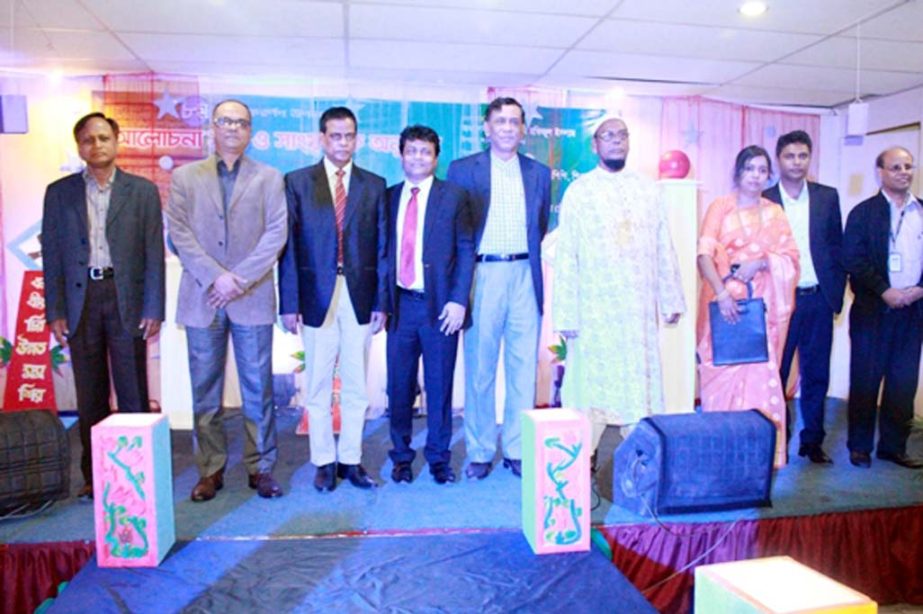 Teachers and students of Bangla Language and Literature Department of South East University are seen at the celebration of the Department's 7th Anniversary at Banani Campus of the University on Monday.