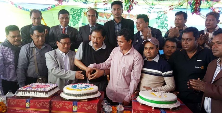 State Minister for Chittagong Hill Tracts Bir Bahadur MP cutting cakes on the occasion of the X- mas on Sunday.