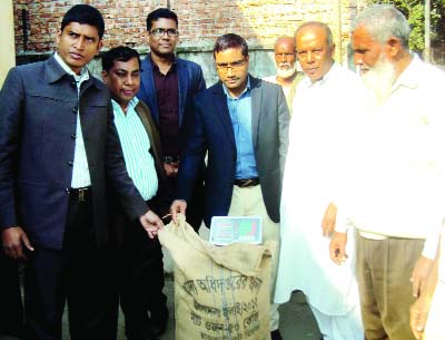 SAGHATA(Gaibandha): Uzzal Kumar Ghosh, UNO, Saghata Upazila inaugurating Aman rice procurement drive at Bonarpra Government Food Godown of Food Department on Tuesaday.