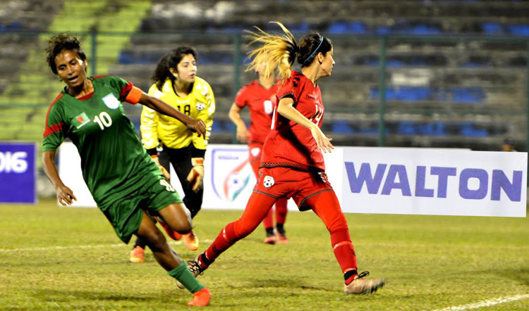 A moment of the SAFF Women's Championship between Bangladesh National Women's Football team and Afghanistan National Women's Football team at Shiliguri in India on Thursday. Bangladesh Women won the match 6-0.