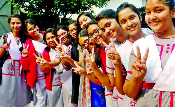 Students of Holy Cross School and College celebrating their results of JSC's examination on Thursday.