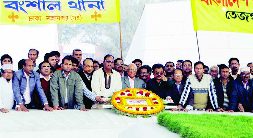 BNP Standing Committee Member Dr Khondkar Mosharraf Hossain along with party colleagues placing wreaths at the Mazar of Shaheed President Ziaur Rahman in the city on Saturday on the occasion of founding anniversary of Jatiyatabadi Krishak Dal.