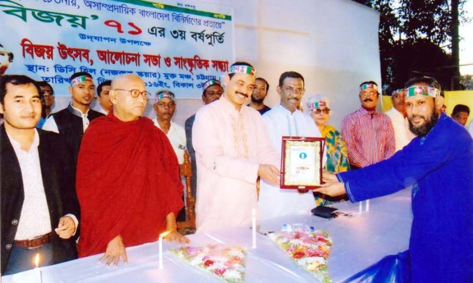 CCC Mayor AJM Nasir Uddin give a honorary Crest to Joint Secretary of Bijoy 71 Dr. Borun Kumar Achargoy Bolai for his research and publication of Maizbhandari story in different daily and Media recently.