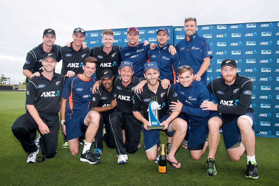 Players of New Zealand cricket team pose with the series trophy at Nelson on Saturday.