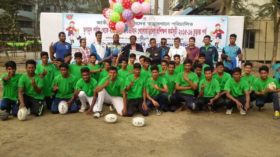 The participants of the grass-root level under-16 talent hunt rugby programme with the guest and officials of Bangladesh Rugby Federation pose for a photograph at the Paltan Maidan on Saturday.