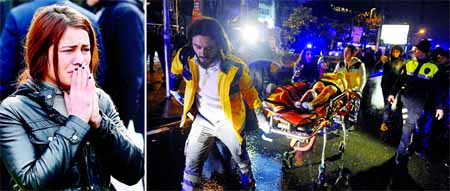 Medics carry a wounded person at the scene after an attack at the popular nightclub in Istanbul. (Inset) A victims' relative broke down in tears. Internet photo