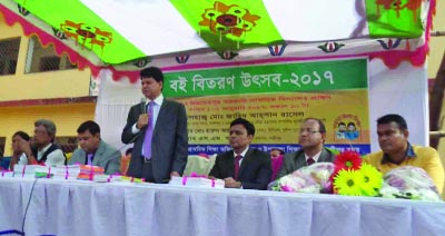 GAZIPUR: S M Alam, DC, Gazipur speaking at the textbook distribution programme at Joydevpur Govt Primary School as Chief Guest in observance of the National Textbook Festival on Sunday.