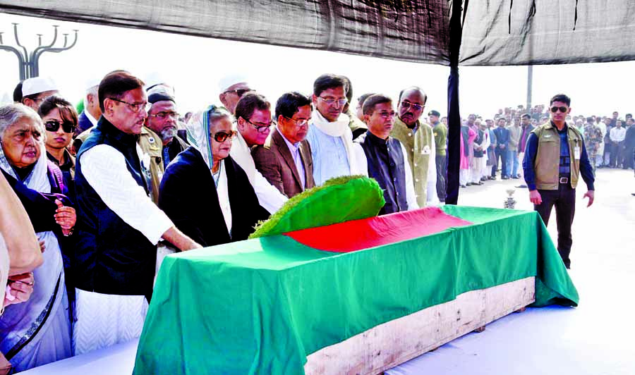 Prime Minister and Awami League President Sheikh Hasina along with party colleagues placing floral wreaths on the coffin of Manjurul Islam Liton, MP on behalf of the party at the South Plaza of the Jatiya Sangsad on Monday. BSS photo