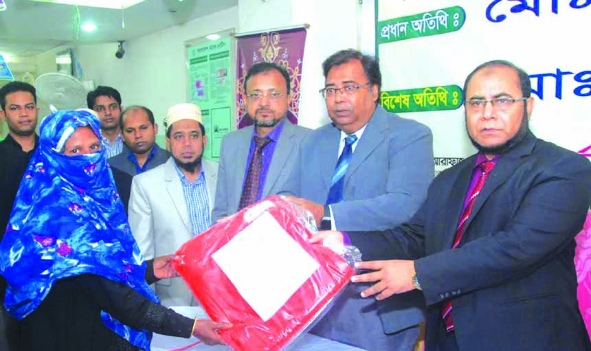 Md. Fazlul Karim, Deputy Managing Director of Al-Arafah Islami Bank Limited inaugurates blanket distribution programs among the cold effected people organized by AIBL Kolatia and Ati Bazar branches on Tuesday. As a part of its CSR activities, the bank is