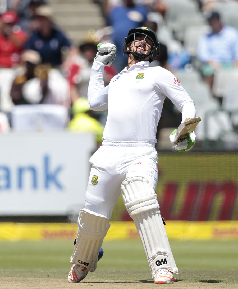 Quinton de Kock punches the air after reaching his hundred on the second day of the 2nd Test between South Africa and Sri Lanka at Cape Town in South Africa on Tuesday.