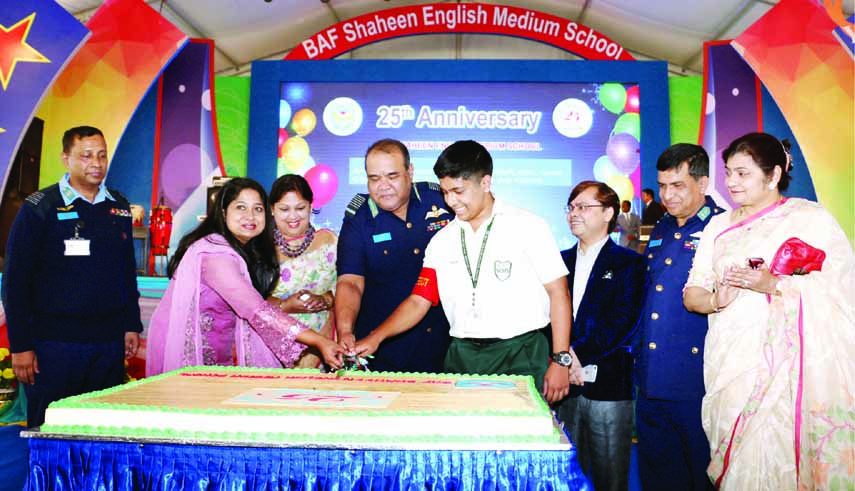 Chief of Air Staff Air Chief Marshal Abu Esrar cutting cake on the occasion of Silver Jubilee of BAF Shaheen English Medium School on Wednesday at the school premises. Photo : ISPR