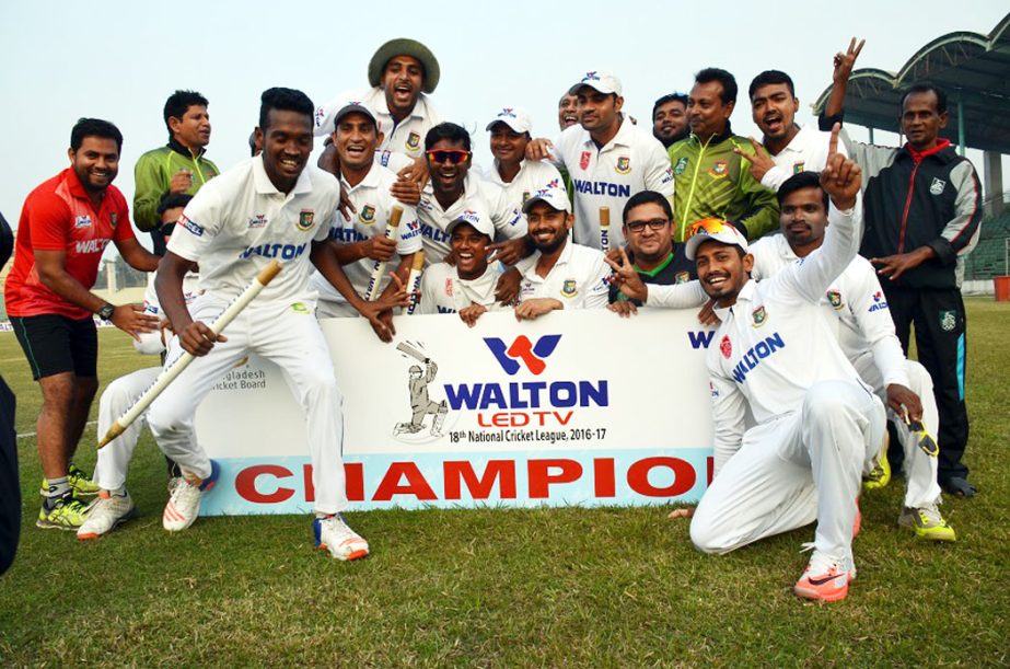 Members of Khulna Division Cricket team celebrate after successfully defending their title at Khan Shaheb Osman Ali Stadium in Fatullah on Thursday.