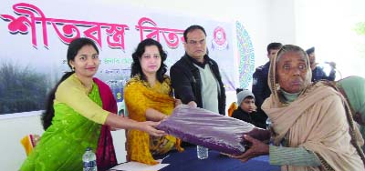 JHENAIDAH: Minazur Rahman, SP, Jhenaidah distributing blankets among the poor people organised by Jhenaidah Police Nari Kalyan Samity on Thursday.