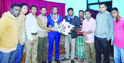 SYLHET: Shofiee Ahmed Shofiee, Sylhet Correspondent, The New Nation and Acting General Secretary, South Surma Press Club presenting a bouquet to Khalechh Uddin Ahmed, Speaker Councillor, Tower Helmet at a reception programme in Sylhet recently.