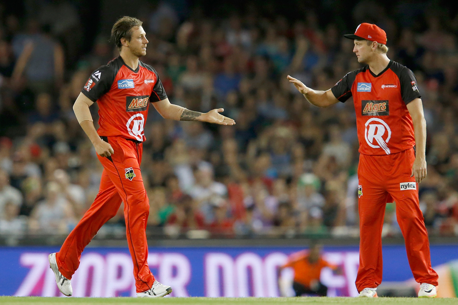 James Pattinson celebrates a wicket with Cameron White in the Big Bash League between Renegades and Stars at Melbourne on Saturday.