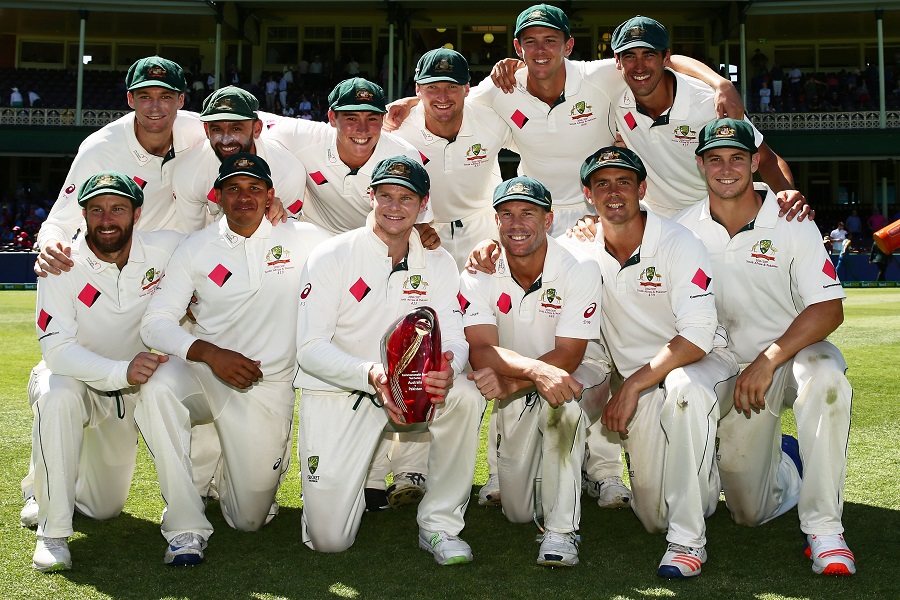 The players of Australia pose with the trophy after Australia beating Pakistan 3-0 in the series after the 5th day of the 3rd Test between Australia and Pakistan at Sydney on Saturday.