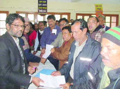 MADHUKHALI(Faridpur): Members of Sramik Karmochari Sangram Parishad and other organisations submitting nomination papers of biennial election-2017 of Faridpur Sugar Mill Labour Union in Madhukhali Upazila recently.