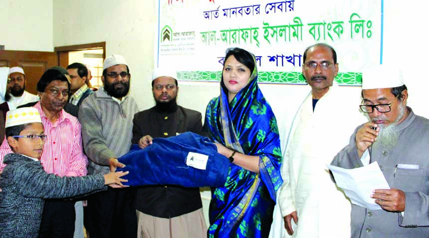 Jebunnesa Afroz, MP inaugurated a blanket distribution program organized by Al-Arafah Islami Bank Limited (AIBL) Barisal Branch recently. Head of Anatomy Department of Barisal Medical College Dr. Golam Rahman Kabir, President of Muslim Gorostan Madrasa Mo