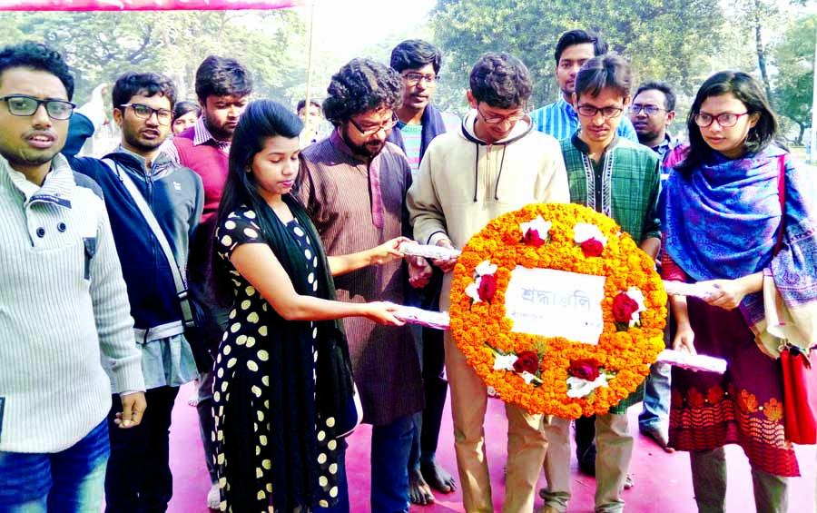 Leaders and activists of Bangladesh Chhatra Federation placing floral wreaths at the Central Shaheed Minar in the city on Tuesday marking its 32nd founding anniversary.