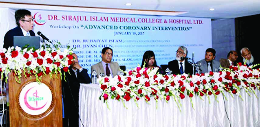 Eminent cardiologist Dr. Jiyan Chen speaking at a seminar on â€˜Advanced Coronary Intervenationâ€™ at Dr. Sirajul Islam Medical College & Hospital at Maghbazar in the city yesterday.