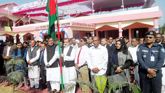 Chairman of the Parliamentary Standing Committee on Ministry of Railway ABM Fazle Karim Chowdhury MP hoisting National Flag on the occasion of inauguration of newly- built UP Complex of No.14 Bagowan Union Parishad under Raozan upazila as Chief Guest on