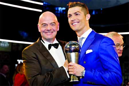 Portugal's Cristiano Ronaldo (right) poses with FIFA President Gianni Infantino after winning the Best FIFA Men's Player award during the â€˜Best FIFA Football Awards 2016â€™ ceremony held at the Swiss TV studio in Zurich, Switzerland on Monday