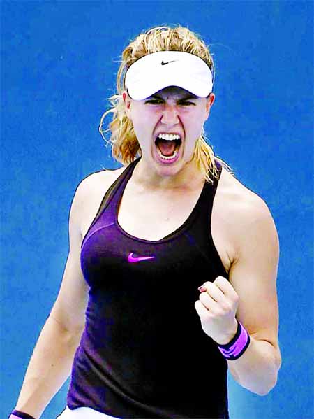 Canada's Eugenie Bouchard celebrates her win over Dominika Cibulkova of Slovakia during their women's singles match at the Sydney International Tennis tournament in Sydney on Tuesday.