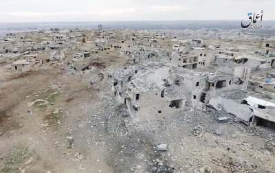 An aerial image of a neighborhood damaged by Turkish airstrikes in the northern Syrian town of al-Bab, in Aleppo province, Syria.